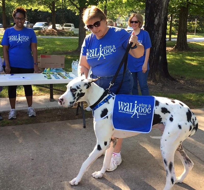 therapy dog at a children's reading event