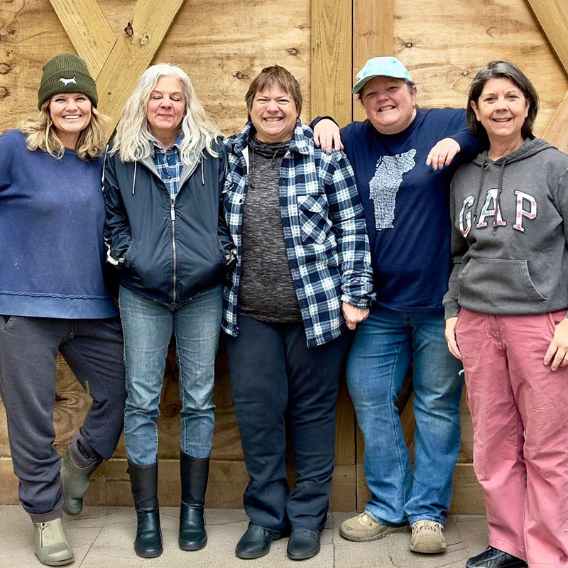 c4-volunteers-farm-chores Chance & Clooney Care Crew volunteer at a rescue animal farm
